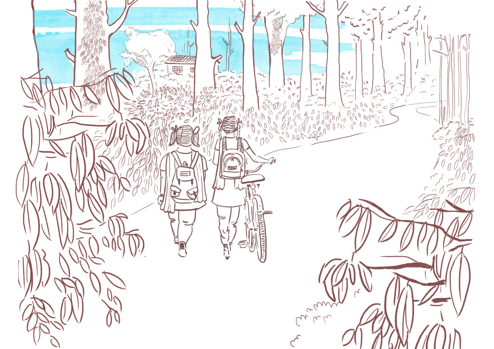 Suprita and Lakshmi walking to school with their bicycle